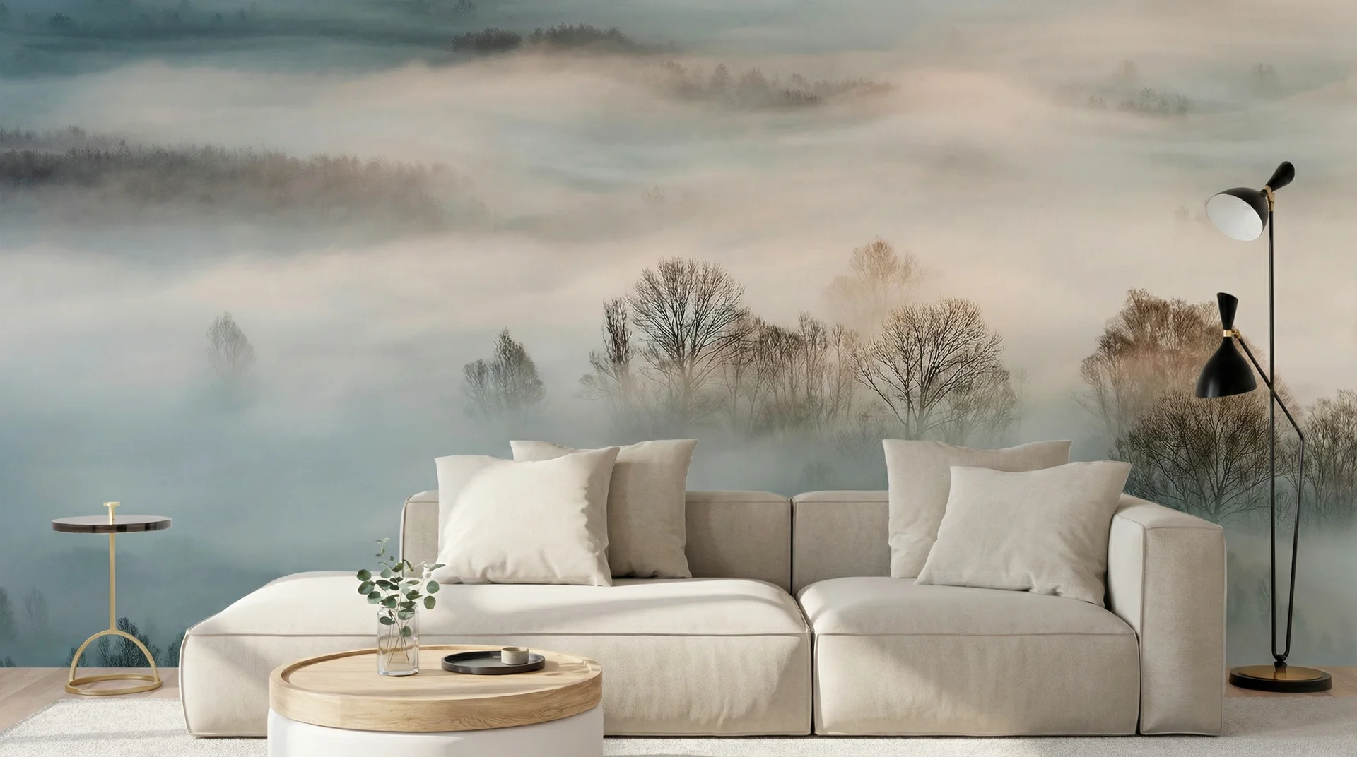 Misty forest landscape wallpaper in a modern living room with neutral-toned sofa and minimalist decor
